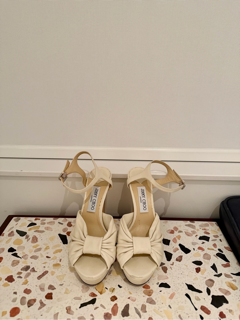 Jimmy Choo Heloise 120
Latte Nappa Leather Platform Sandals